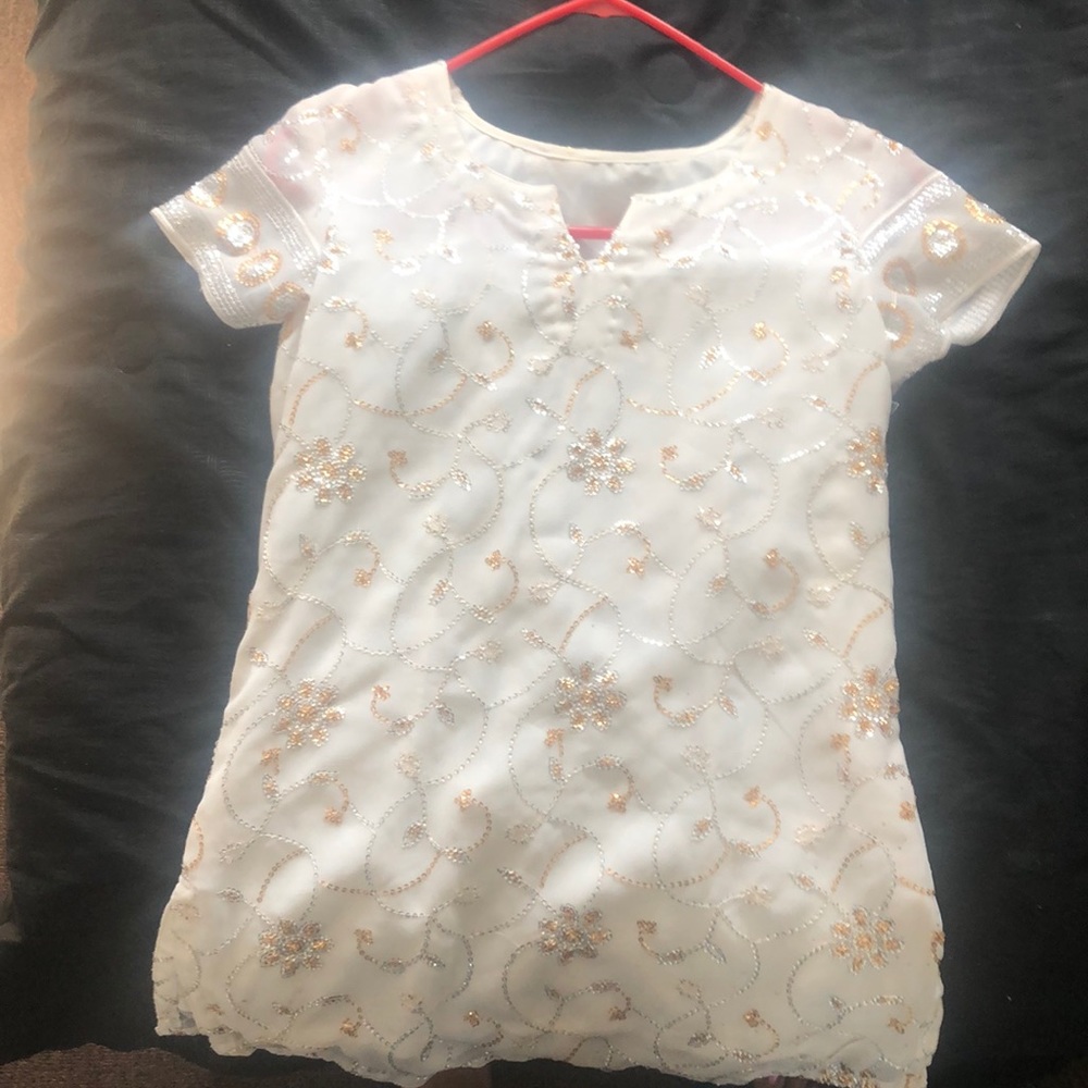 White & gold shirt